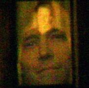 04Ep021L1: Jack's face reflected in his photo
